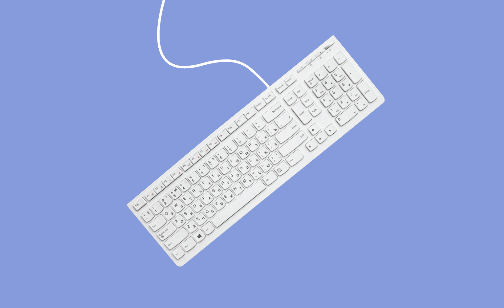 A white keyboard on a purple background to symbolise writing seo content